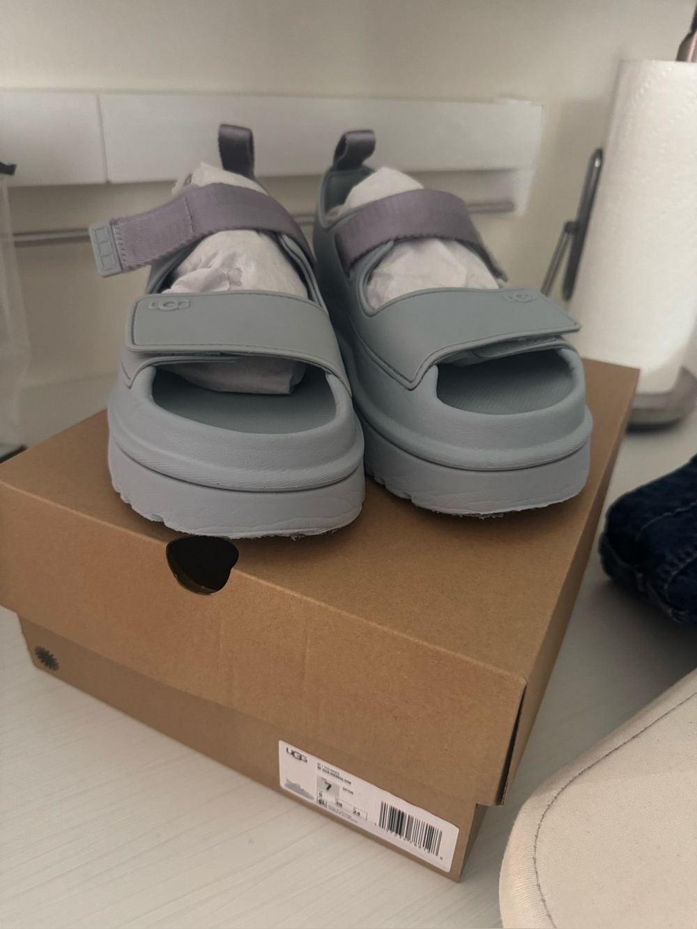UGG GoldenGlow Sandals in a light grey-blue shade featuring chunky platform 7